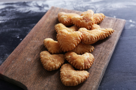 Biscuits on cutting board, closeupの写真素材