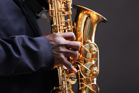 African American jazz musician playing the saxophone, closeupの写真素材