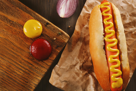 Hot dog with on craft paper closeupの写真素材
