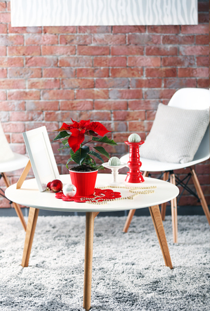 Modern room interior with Christmas flower poinsettiaの写真素材