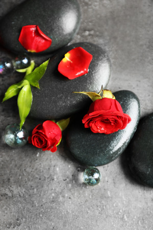 Beautiful spa composition with roses and stonesの写真素材