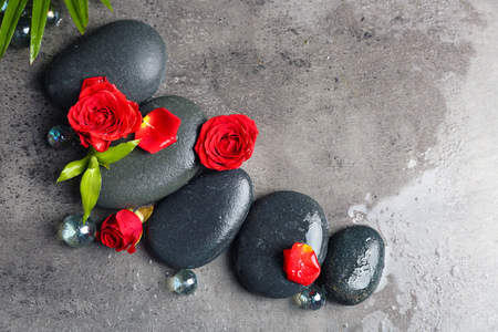 Beautiful spa composition with roses and stonesの写真素材