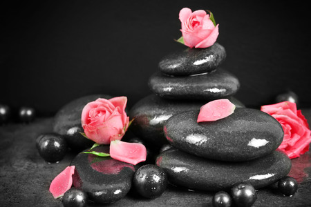 Beautiful spa composition with roses and stonesの写真素材
