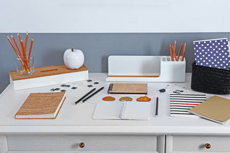 Office and school set with stationery and notebooks on a tableの写真素材