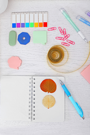 Office and school set with stationery and notebook on a tableの写真素材