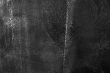 Silver foil texture with crumpled uneven surfaceの写真素材