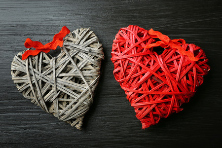 Beautiful romantic hearts on wooden background