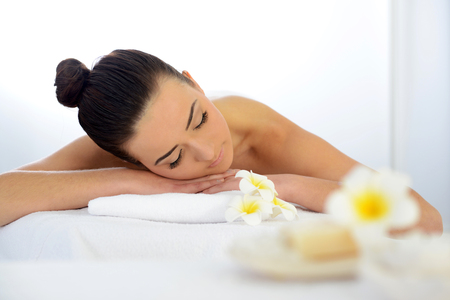 Young pretty woman relaxing in salon, close upの写真素材