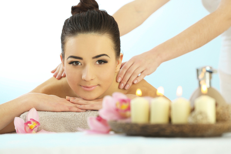 Spa concept. One do relaxing massage to pretty woman, close upの写真素材