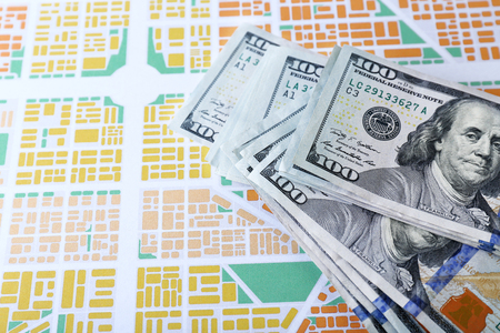 Cash on the city map background, close upの写真素材