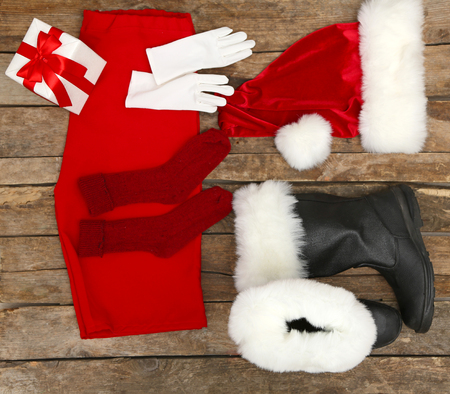 Santa Claus costume on wooden background, close upの写真素材