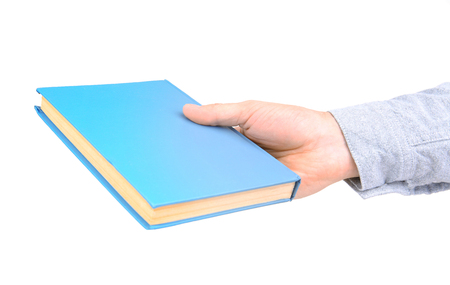 Man hand holding book, isolated on whiteの写真素材