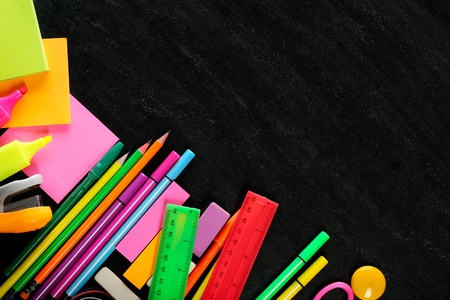 Back to school concept. Colourful stationery on black backgroundの写真素材