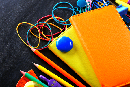 Colourful stationery on black backgroundの写真素材