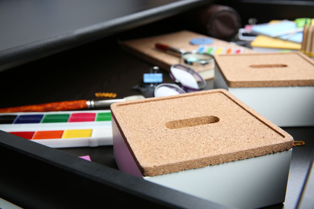 Stationery in open desk drawer closeupの写真素材