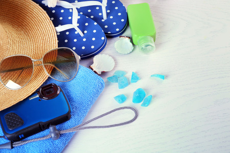 Summer accessories on wooden table, close upの写真素材