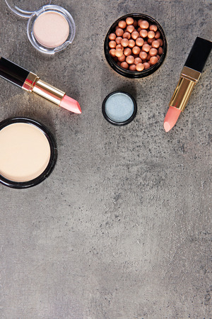 Makeup cosmetics on grey backgroundの写真素材