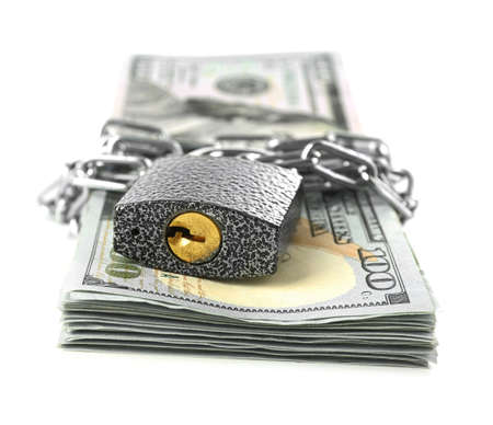Dollars currency with lock and chain, isolated on white