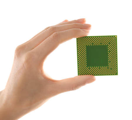Male hand holding microprocessor on white background