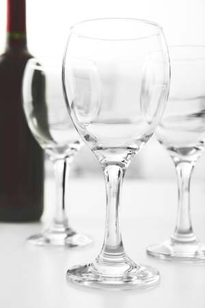 Wineglasses on blurred interior backgroundの写真素材