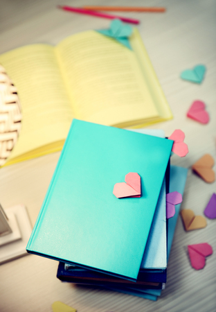Heart bookmarks for books on wooden table closeupの写真素材
