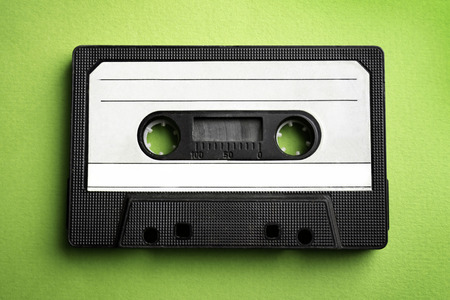 Old audio cassette on red backgroundの写真素材