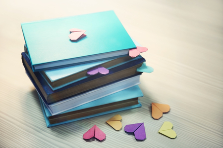 Heart bookmarks for books on wooden table closeupの写真素材