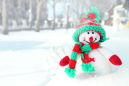 Beautiful snowman on natural snowdrift, close upの写真素材