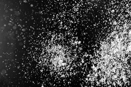 Snow flakes on dark background