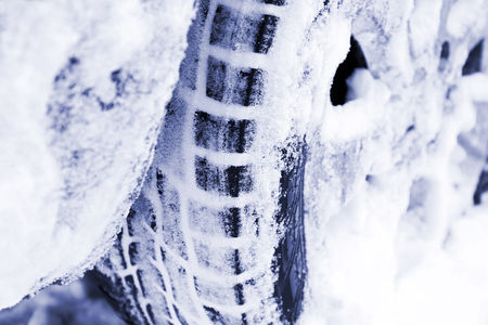 Winter tires in snow, closeupの写真素材