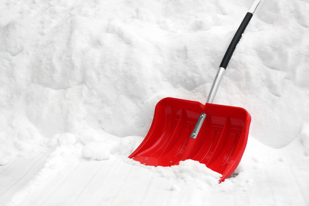 Red shovel for snow removalの写真素材