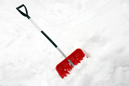 Red shovel for snow removalの写真素材
