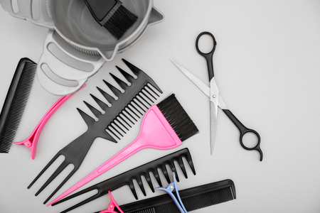 Hairdresser set with various accessories on grey backgroundの写真素材