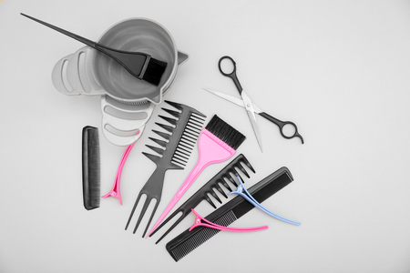 Hairdresser set with various accessories on grey backgroundの写真素材