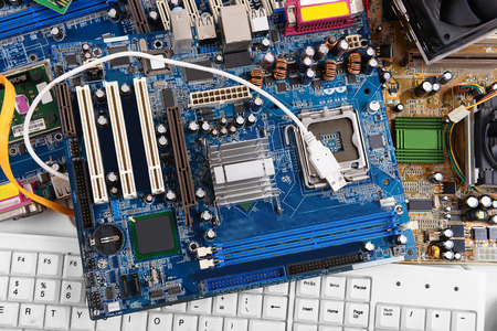 Computer motherboards with keyboard, close up