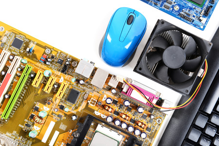 Computer parts with keyboard and mouse on white backgroundの写真素材