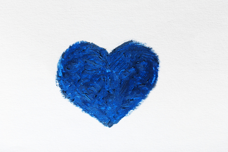 Blue painted colors heart on light backgroundの写真素材