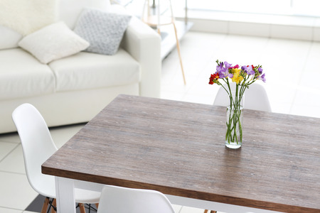 Beautiful comfortable modern interior with table and chairs