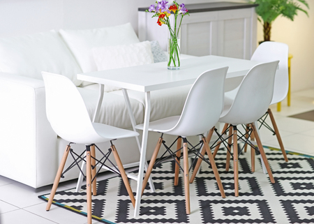 Beautiful comfortable modern interior with table and chairsの写真素材