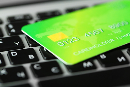 Credit card on keyboard, close upの写真素材