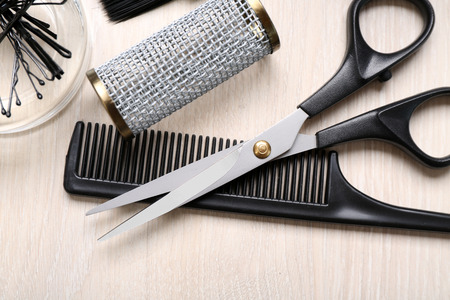 Barber set with tools on light wooden tableの写真素材