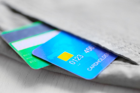 Credit cards in trouser pocket, close up