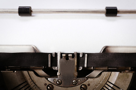 Old typewriter with paper, close upの写真素材