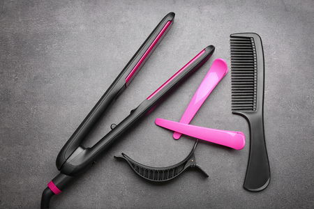 Barber set with equipment and tools on grey backgroundの写真素材