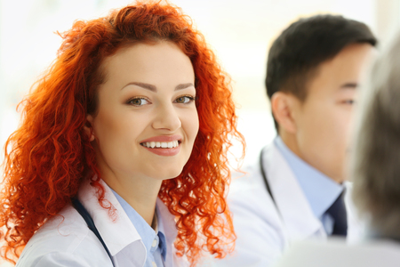 Portrait of smiling doctor in officeの写真素材