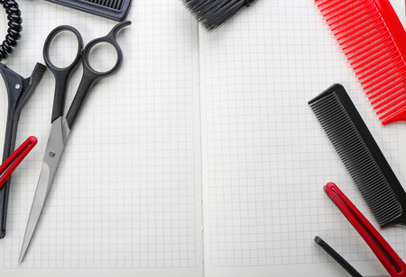 Professional hairdressing equipment on wooden table, copy spaceの写真素材
