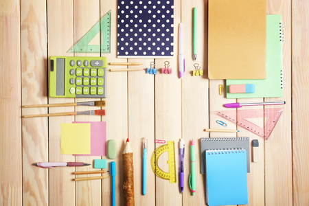Flat lay of stationery on wooden background, copy spaceの写真素材