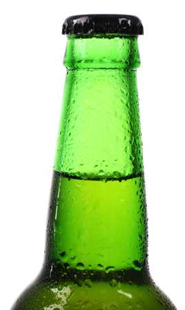 Green glass bottle with beer, isolated on whiteの写真素材