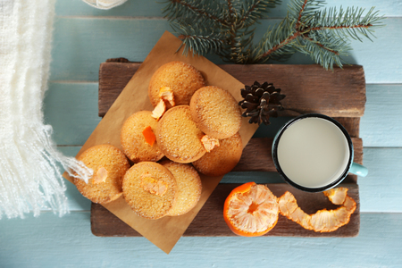 Christmas composition with cookies and decorations on a blue tableの写真素材