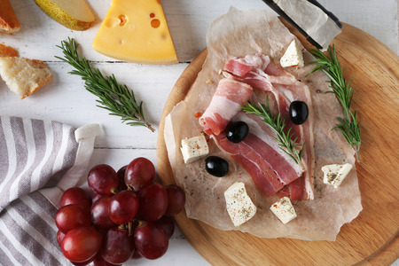 Wine, snacks and different various of cheese, flat layの写真素材